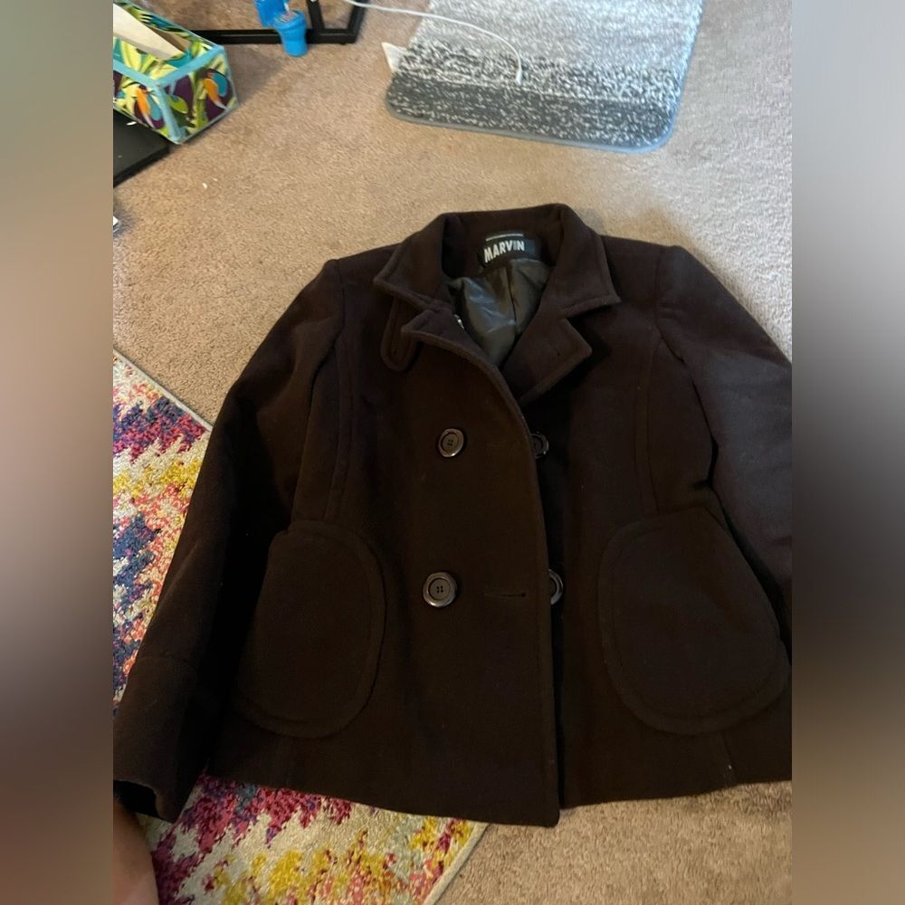 Marvin Richard’s large brown peacoat